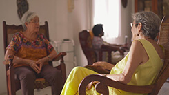 Photo of a Long-term Care Caregiver woman with an elderly male Caretaker