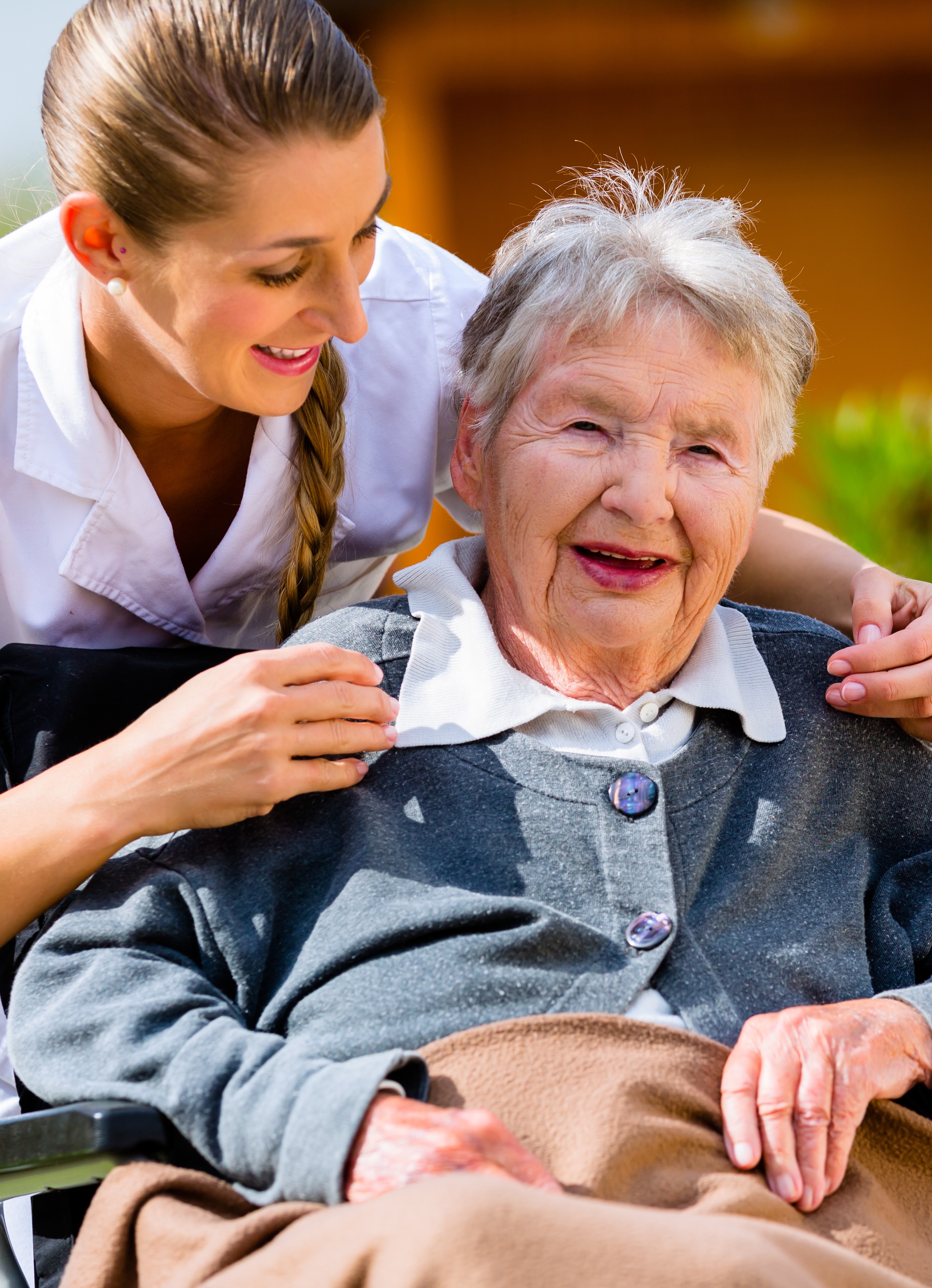 Photo of a Long-term Care Caregiver woman with her elderly Caretaker